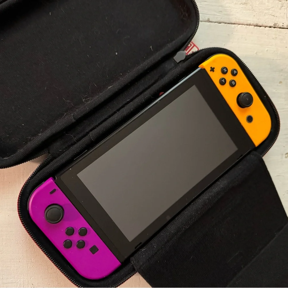 Nintendo Switch with Purple and Orange Joy-Con